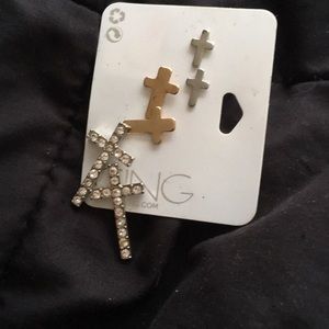 Cross earrings never worn just kept them put up